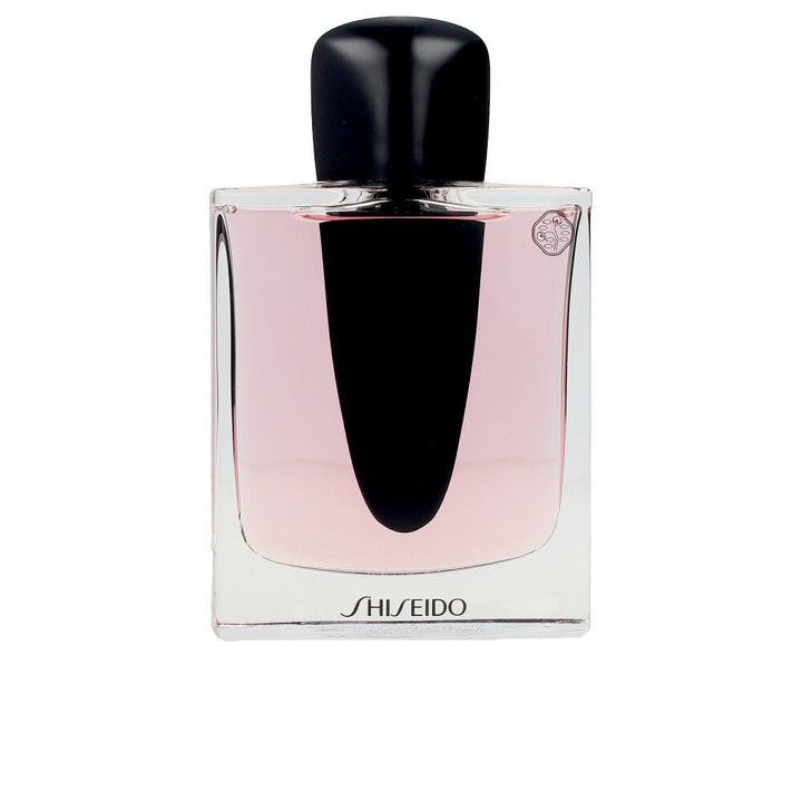 30 ml sculpted perfume bottle; floral‑woody scent for Women