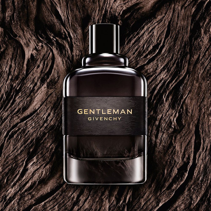 100 ml dark-banded glass bottle of woody floral eau de parfum for Man