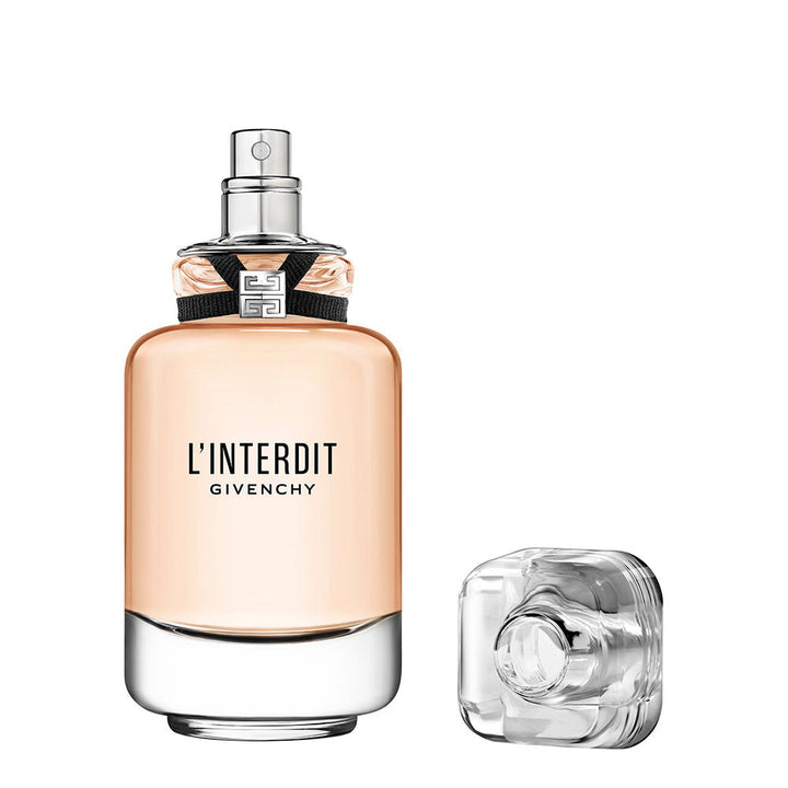 35 ml glass bottle Eau de Toilette with black ribbon and emblem