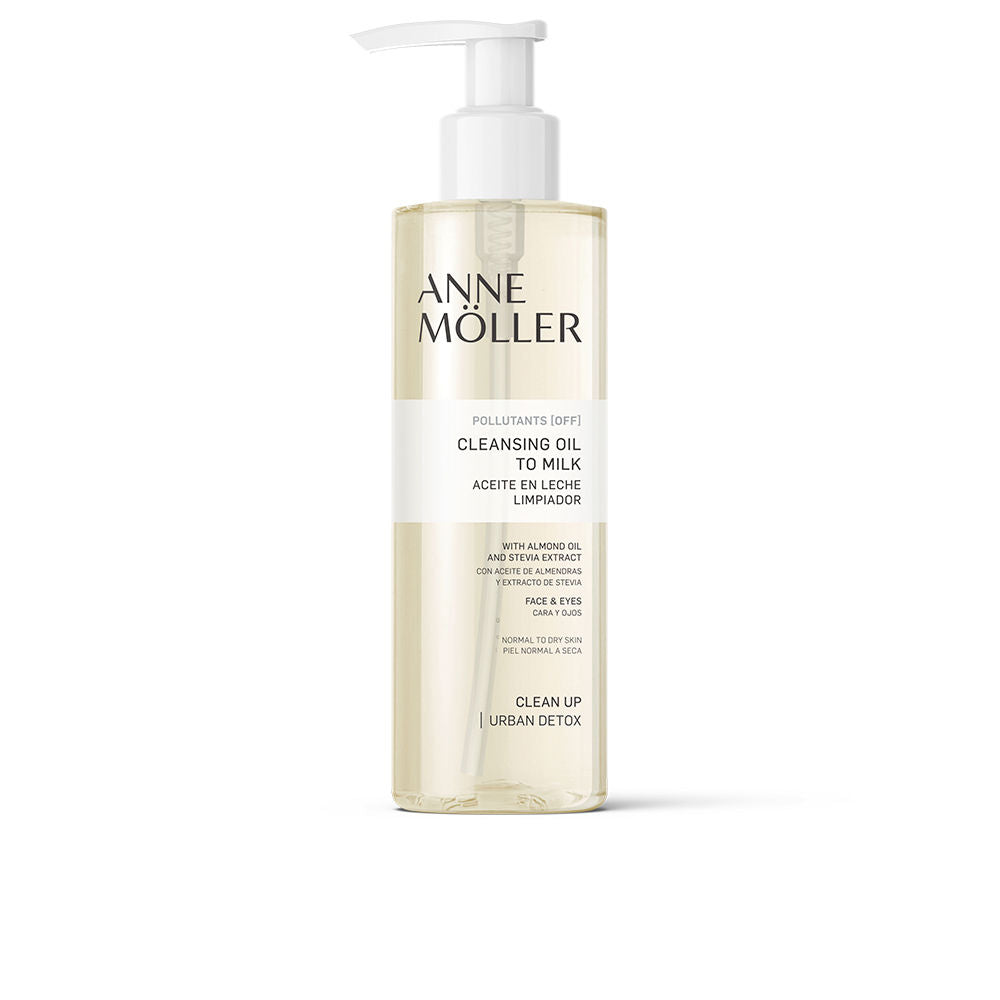 Anne Möller Cleansing Oil-in-Milk bottle with creamy cleanser pouring, neutral backdrop