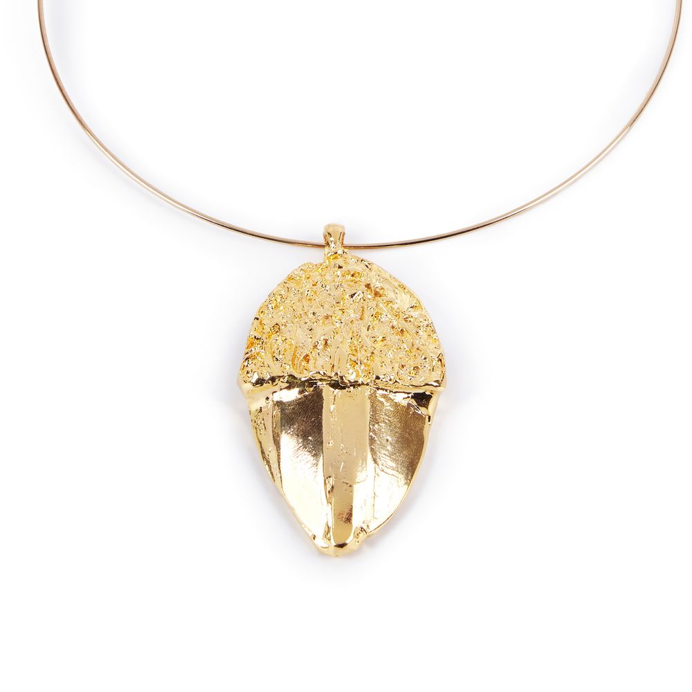 Shabama Gold metal rigid necklace with leaf-shaped acorn pendant, textured top and smooth bottom on thin chain