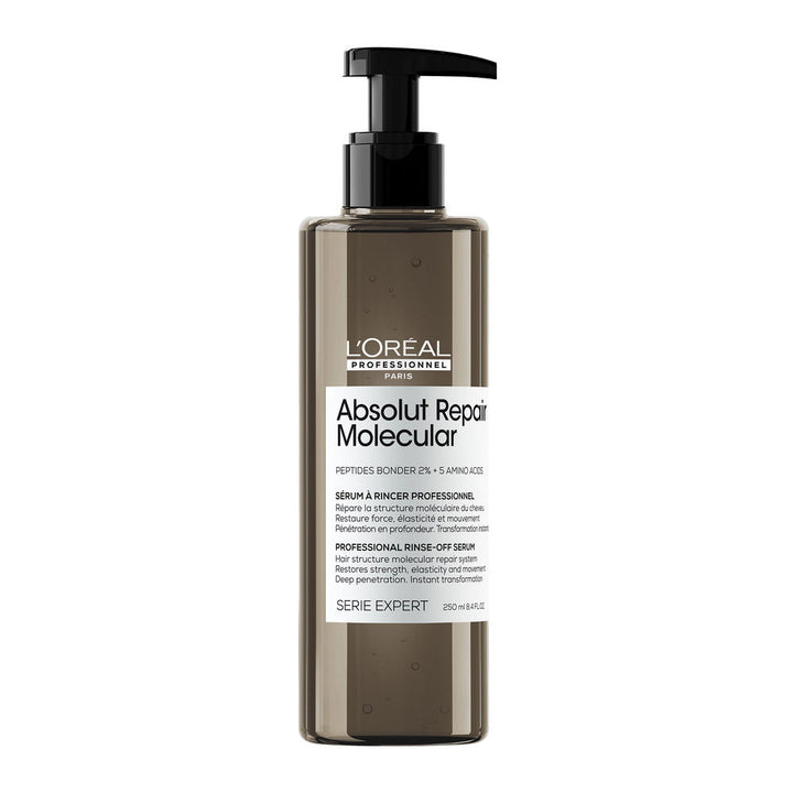 Clear pump serum bottle labelled Repairing Molecular, 250 ml, for damaged hair