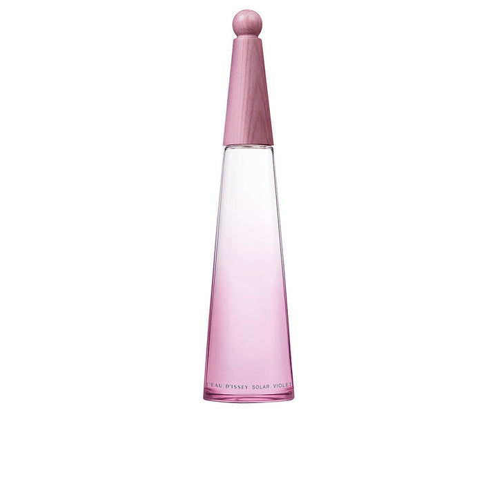 Issey Miyake Minimalist pink gradient glass perfume bottle with tapered silhouette and rounded wooden cap