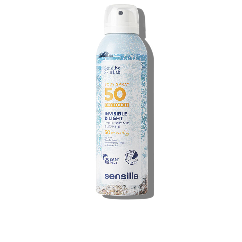 Sensilis Light blue, white and gold aerosol body spray can with navy accents, continuous-spray nozzle and textured water-like pattern