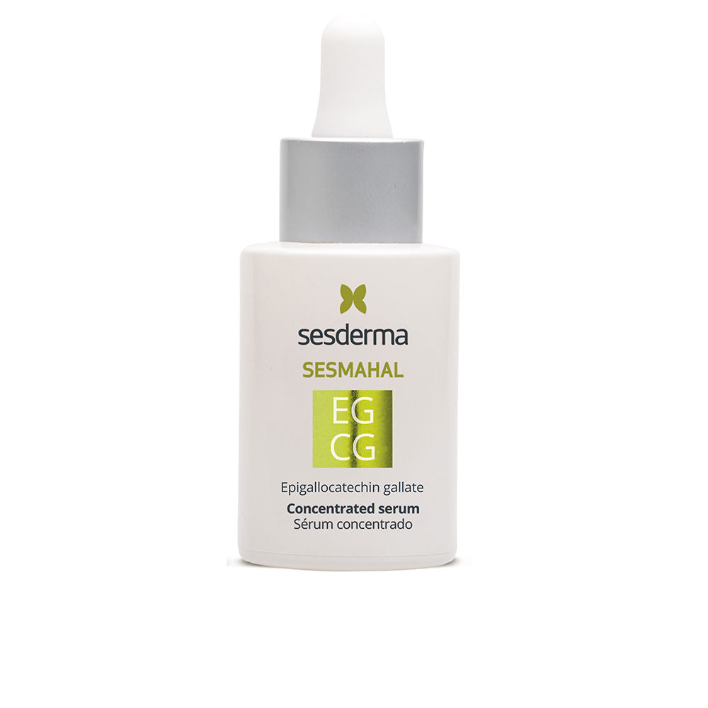 White rectangular plastic serum bottle with dropper cap, matte silver-green print and minimalist detailing, Sesderma