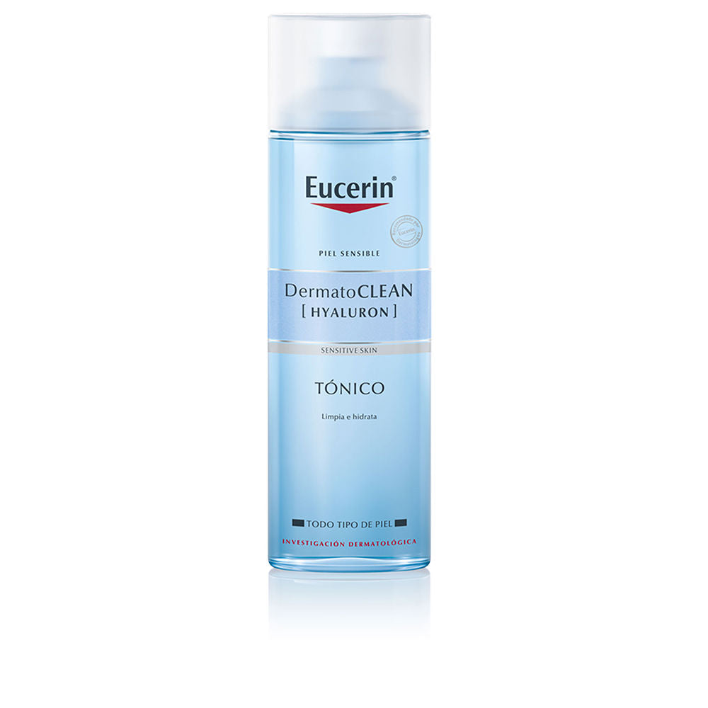 Eucerin Light blue gradient cylindrical plastic tonic with pump and transparent cap, printed labels, minimalist elegance .