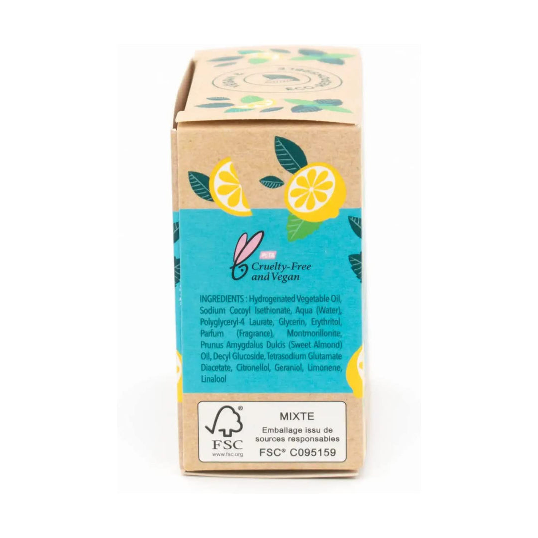Round mint-green solid shampoo bar with paper wrap, 75 g, lemon accent