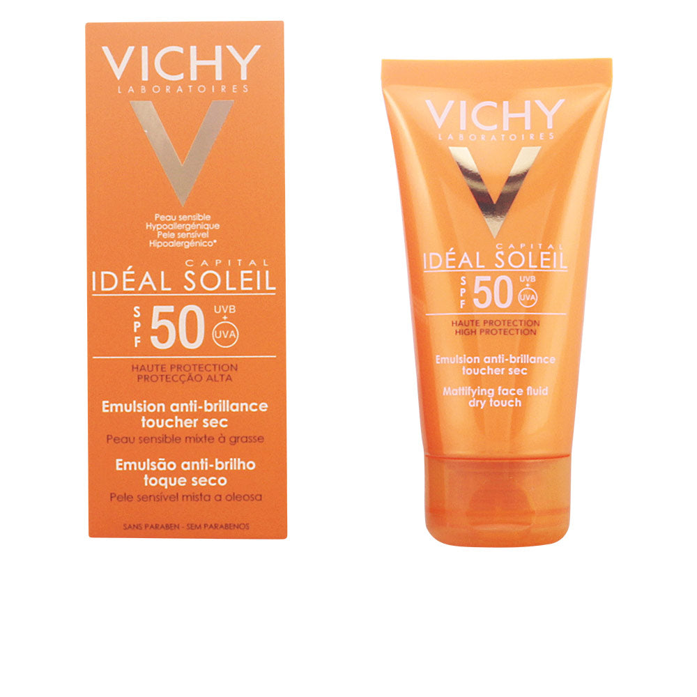 Matte orange plastic sunscreen tube with white and gold text, SPF 50 label and VICHY logo