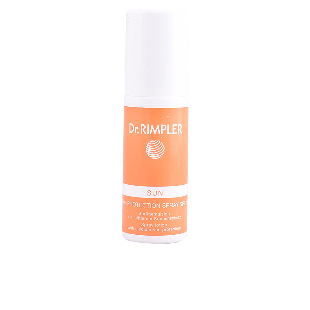 White and orange cylindrical plastic sun protection spray with nozzle cap, printed text and logo, Dr. Rimpler