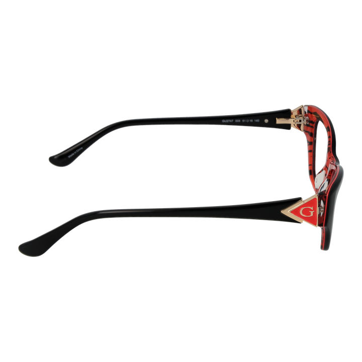 Black and red cat-eye eyeglasses in plastic with gold temples and logo emblem, front three-quarter view