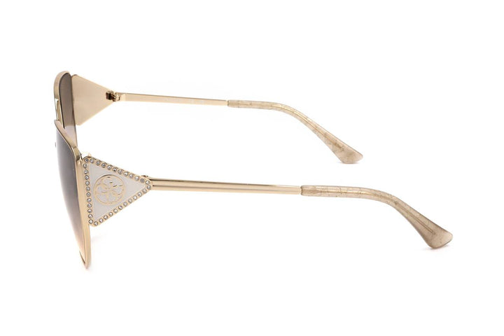 Gold oversized geometric sunglasses with gradient brown lenses and triangular rhinestone accents on temples
