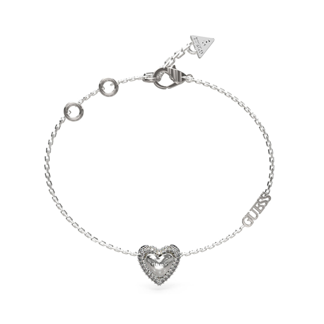 Delicate silver chain bracelet with heart charm, GUESS tag, triangular logo on wrist