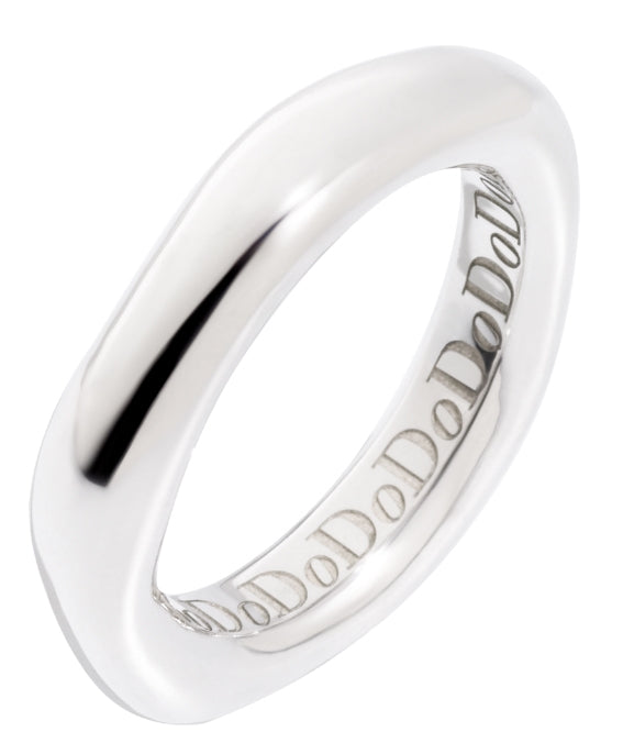 Close-up of a polished silver-toned minimalist engraved band showing subtle text and smooth finish on a finger