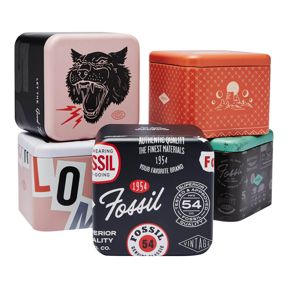 Two-tone Fossil wristwatch in silver and gold with black dial, crystal markers, rotating bezel.