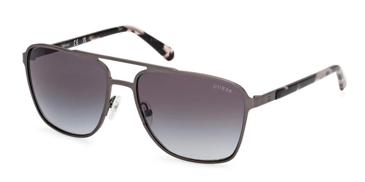 Black metal aviator sunglasses with gradient gray lenses and double bridge, patterned temple tips visible