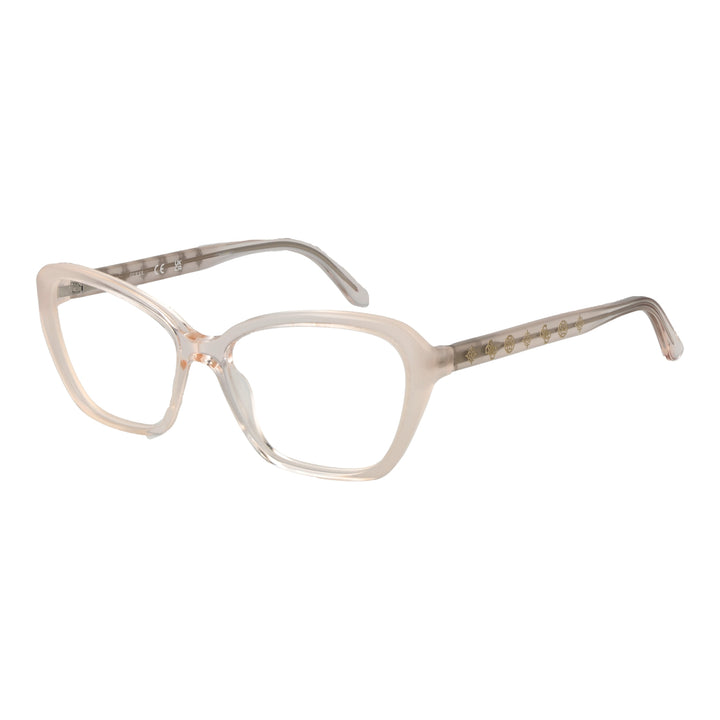 Translucent beige cat-eye eyeglasses in plastic with gold decorative symbols on temples