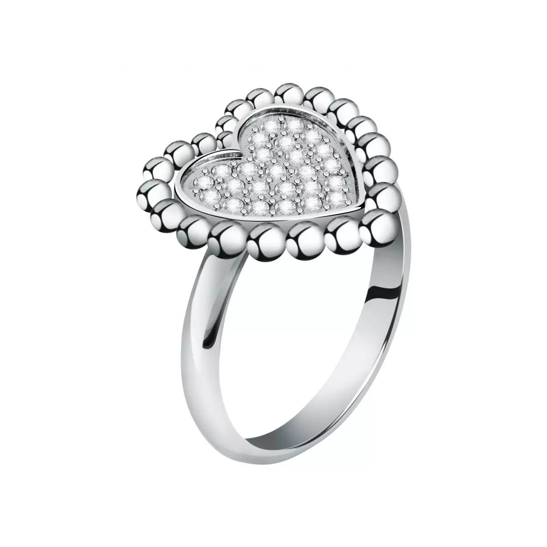 Polished silver heart-shaped ring with pavé crystals on a neutral background, close-up showing detail